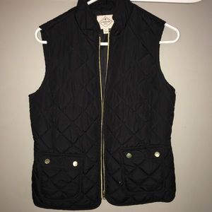Black vest, size small.